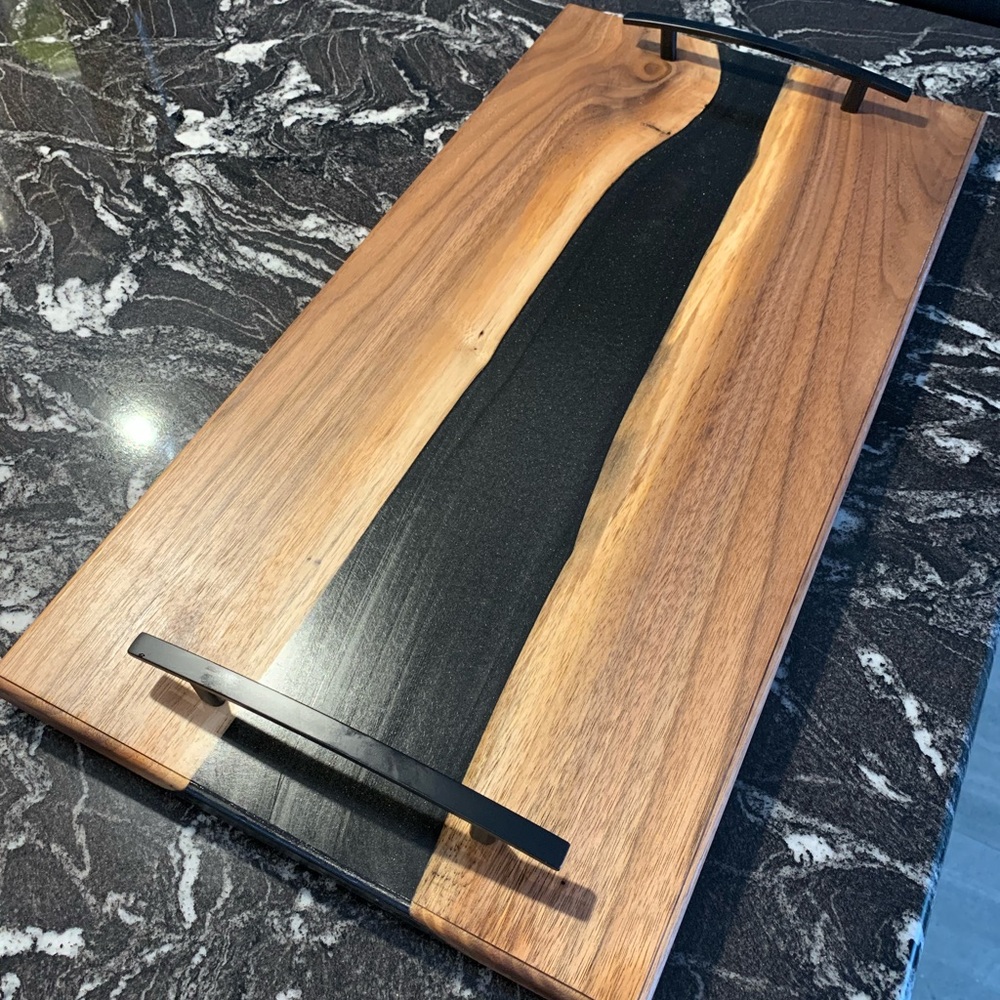 Charcuterie tray- Black walnut, epoxy river with mat black chrome handles.